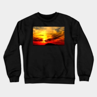 Apocalyptic scenery with a bath of violent clouds in the sunset sky full of raging red and yellow colours Crewneck Sweatshirt